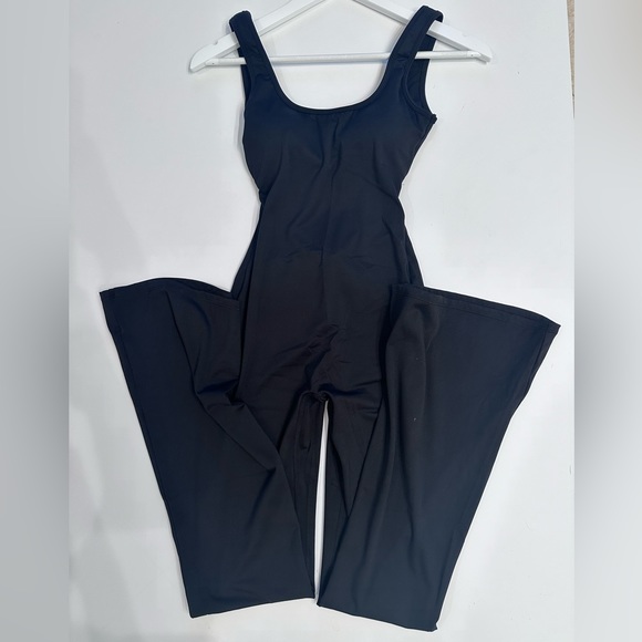 Trendy,  Backless Jumpsuit  Bodysuit with Flared Legs in Size Sm in Black - Picture 6 of 16